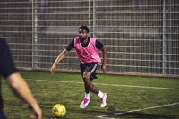 Man playing 5 a side football